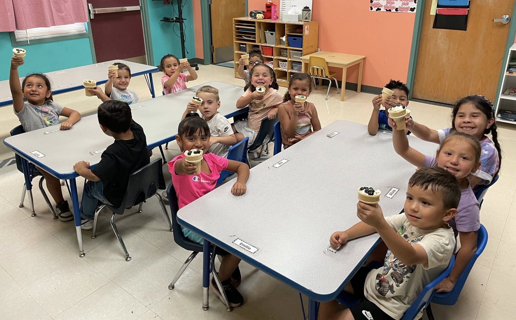 Little steps' Kids Showing Off Kids at Tobosa Learning Center holding out ice cream cones